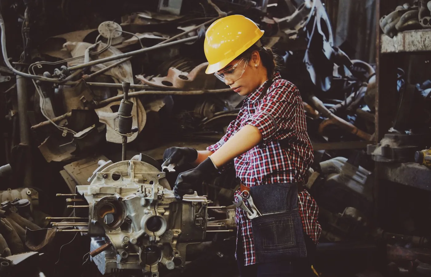 Industrial technician inspecting precision components during supplier readiness assessment